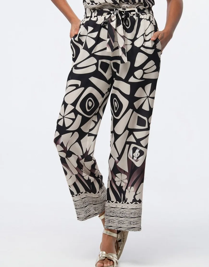 Pantalon chic beige motif